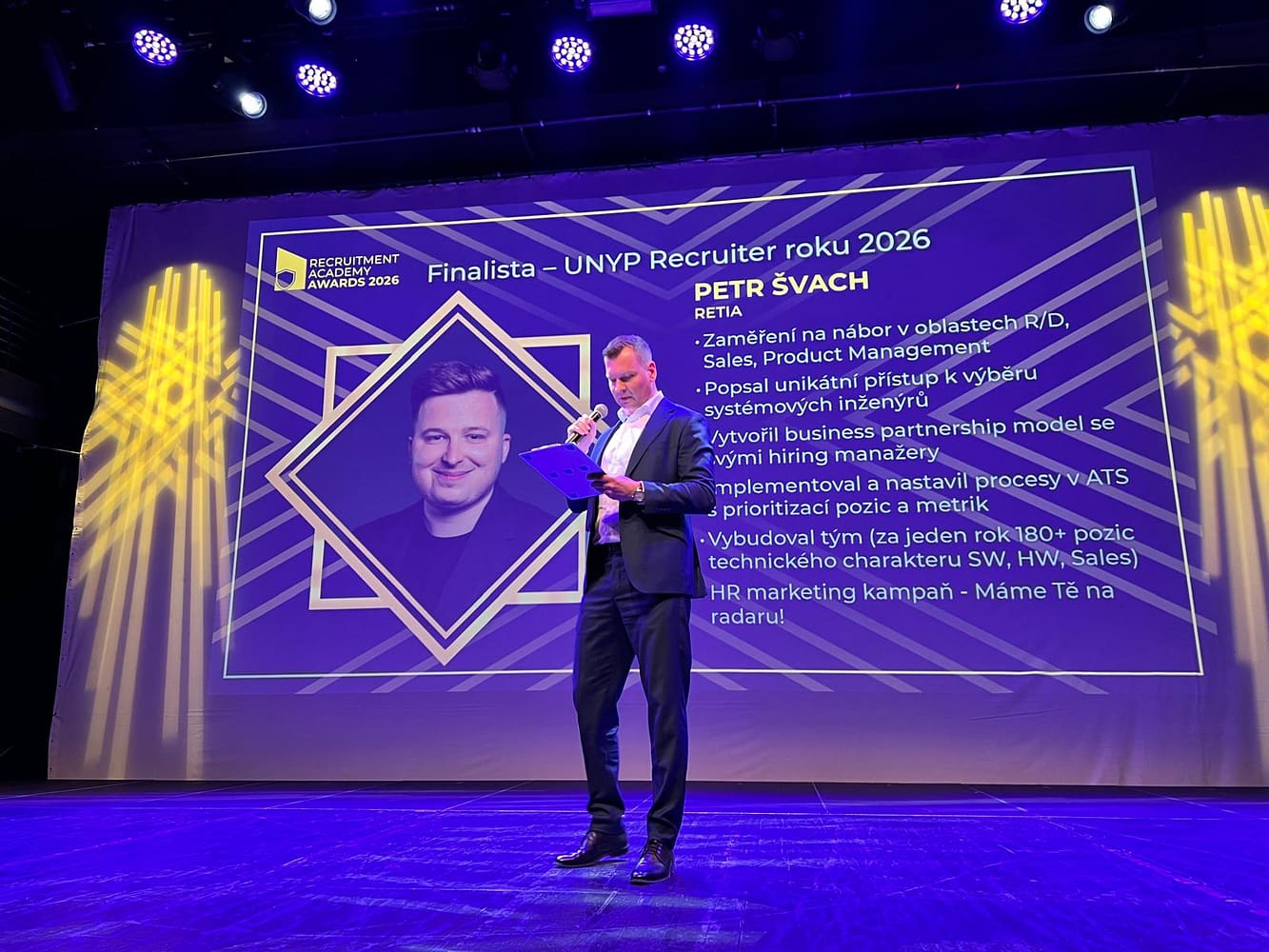 An event organizer introduces the candidates for the Recruiter of the Year Award at the Recruitment Academy Awards