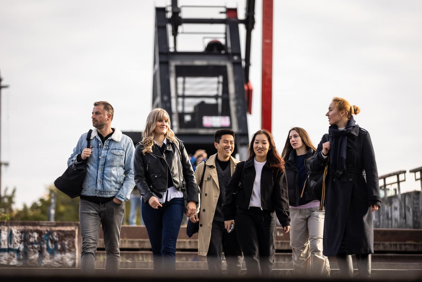 Group of international students walking together outdoors in Prague
