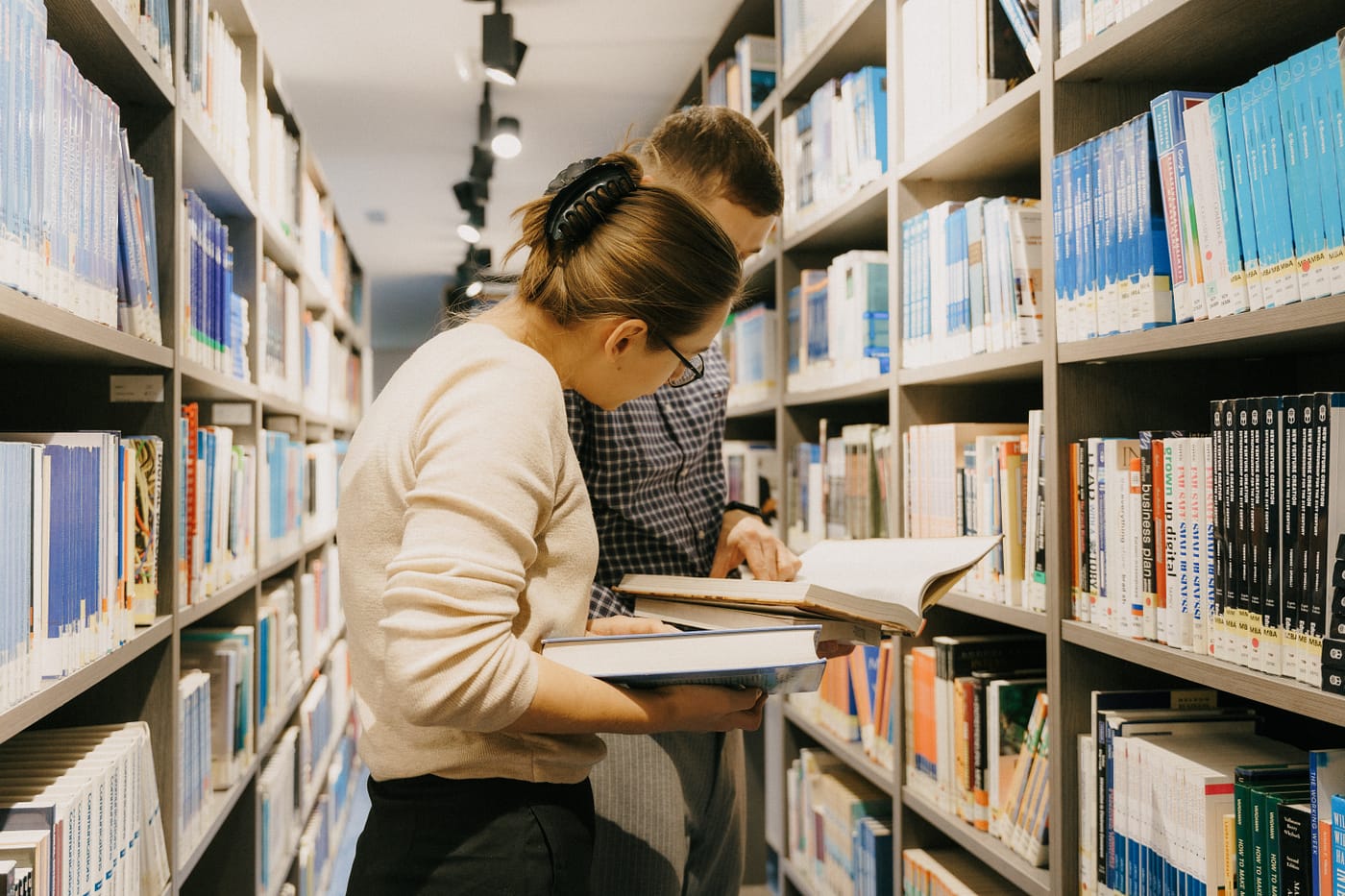 Two UNYP students quietly compare notes in the UNYP library