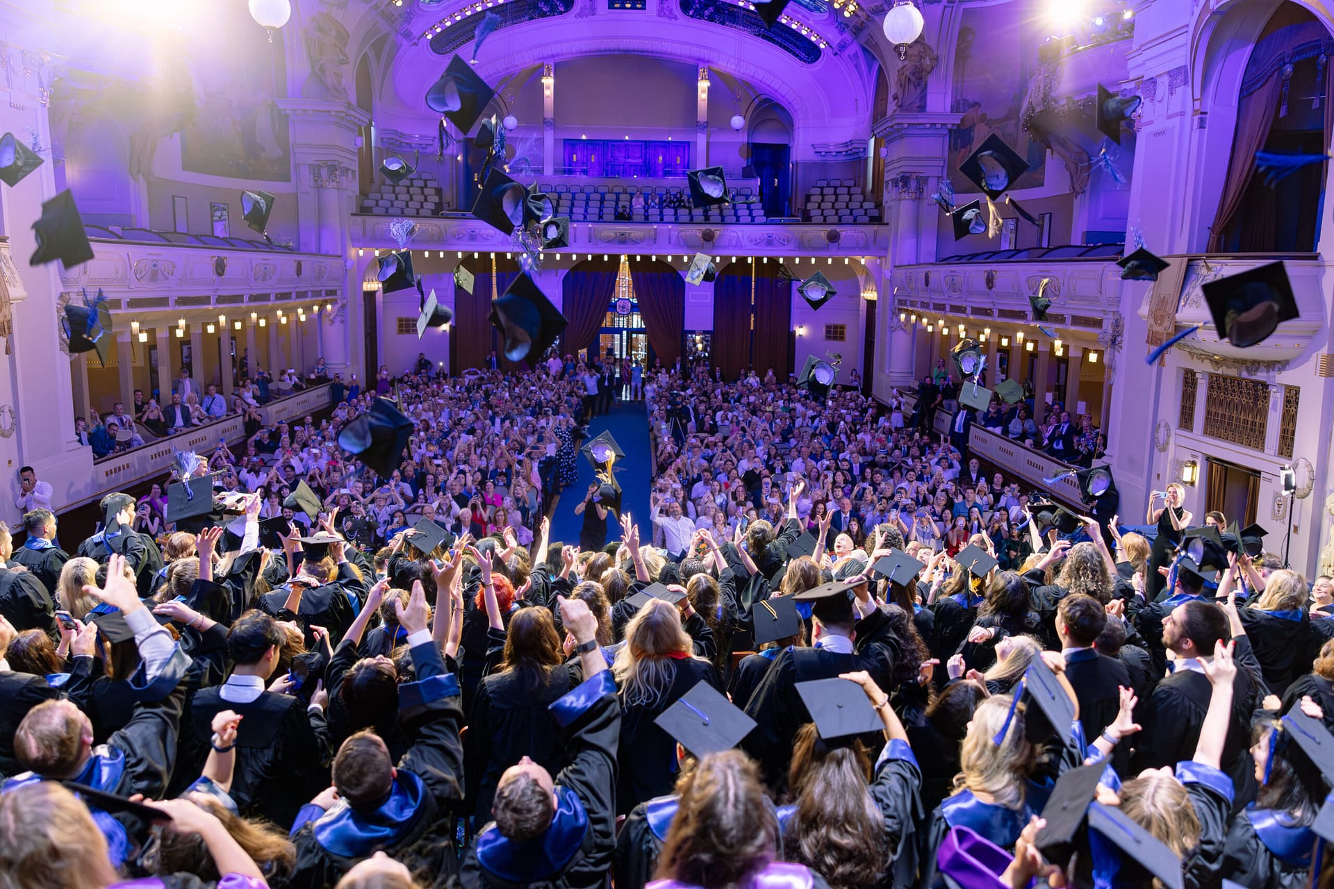Alt Text Students celebrating during the UNYP Graduation Ceremony at Obecní dům in Prague