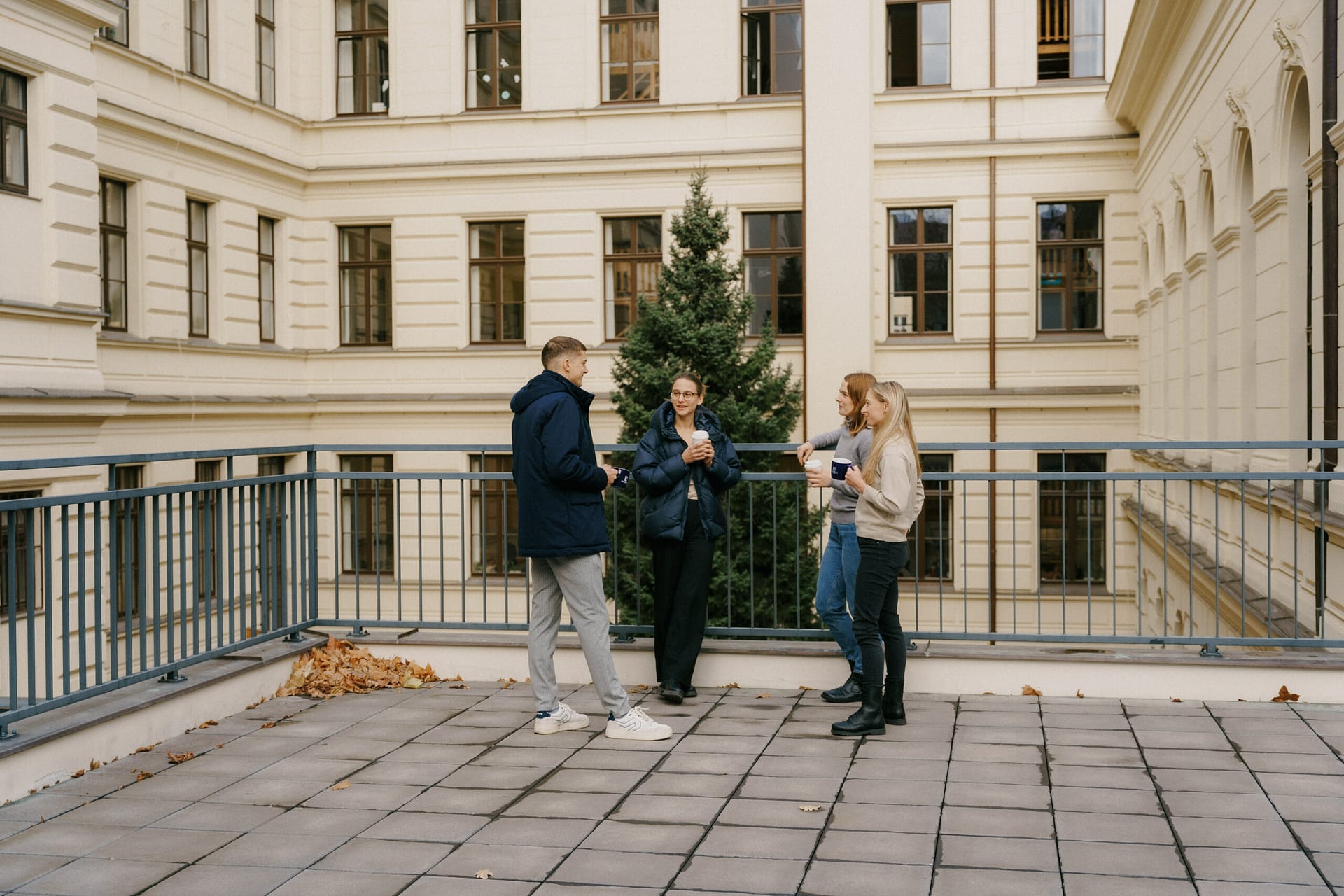 Faculty and students collaborating at the University of New York in Prague, exemplifying a diverse and inclusive academic community